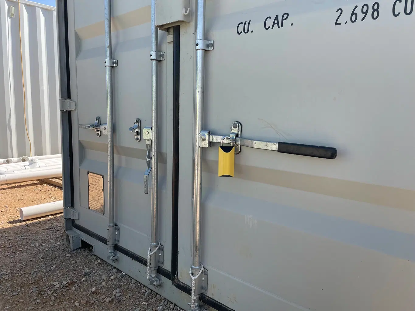 Construction site with distributed access points requiring secure padlock-based access control